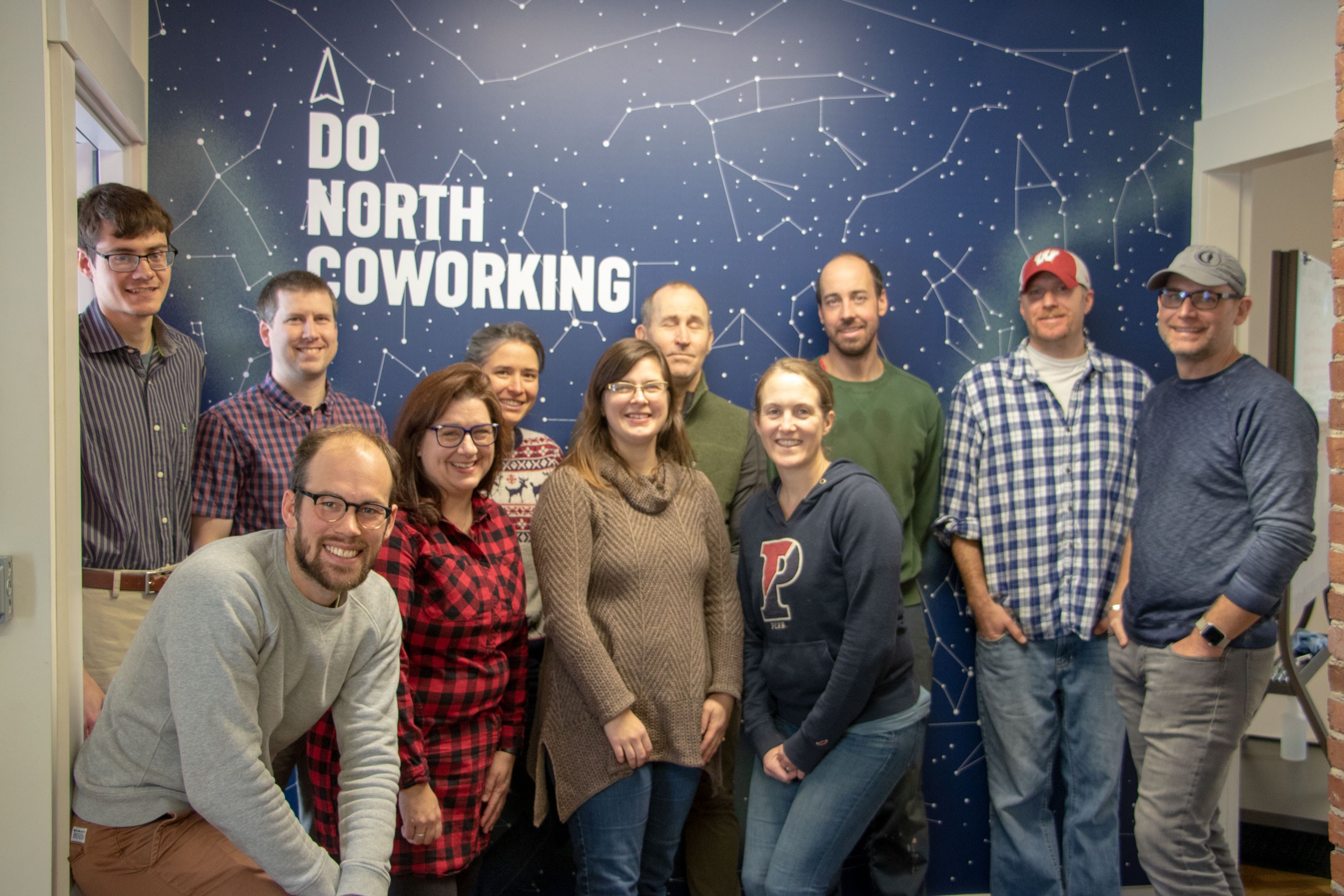 Evan Carlson (lower left) and the staff of Do North Coworking.